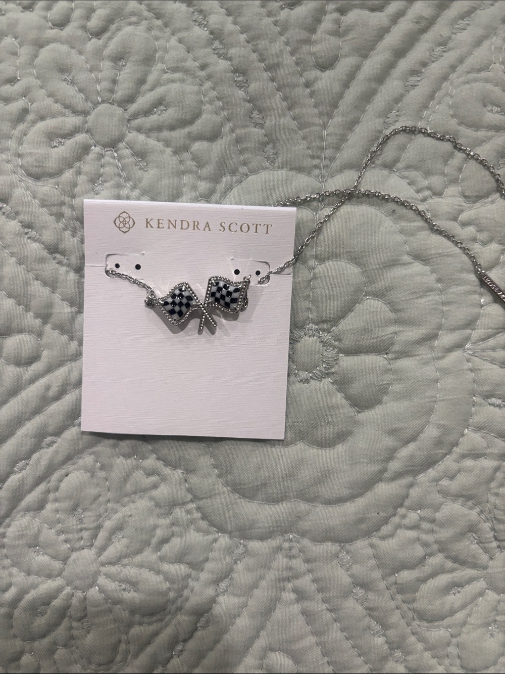 Kendra Scott Silver Necklace with Black-and-White Checkered Flags Pendant